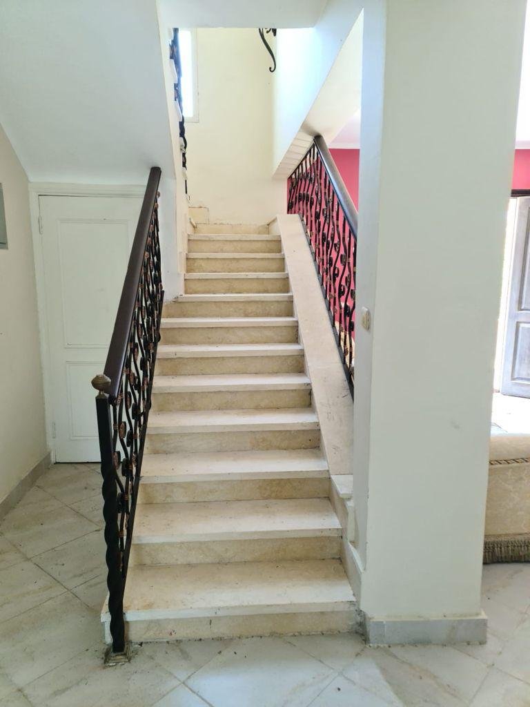 Interior staircase in a villa for sale in Stella Heliopolis