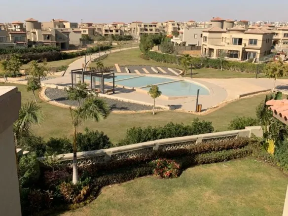 Palm Hills New Cairo compound buildings and greenery - مباني ومساحات خضراء بكمبوند بالم هيلز القاهرة الجديدة