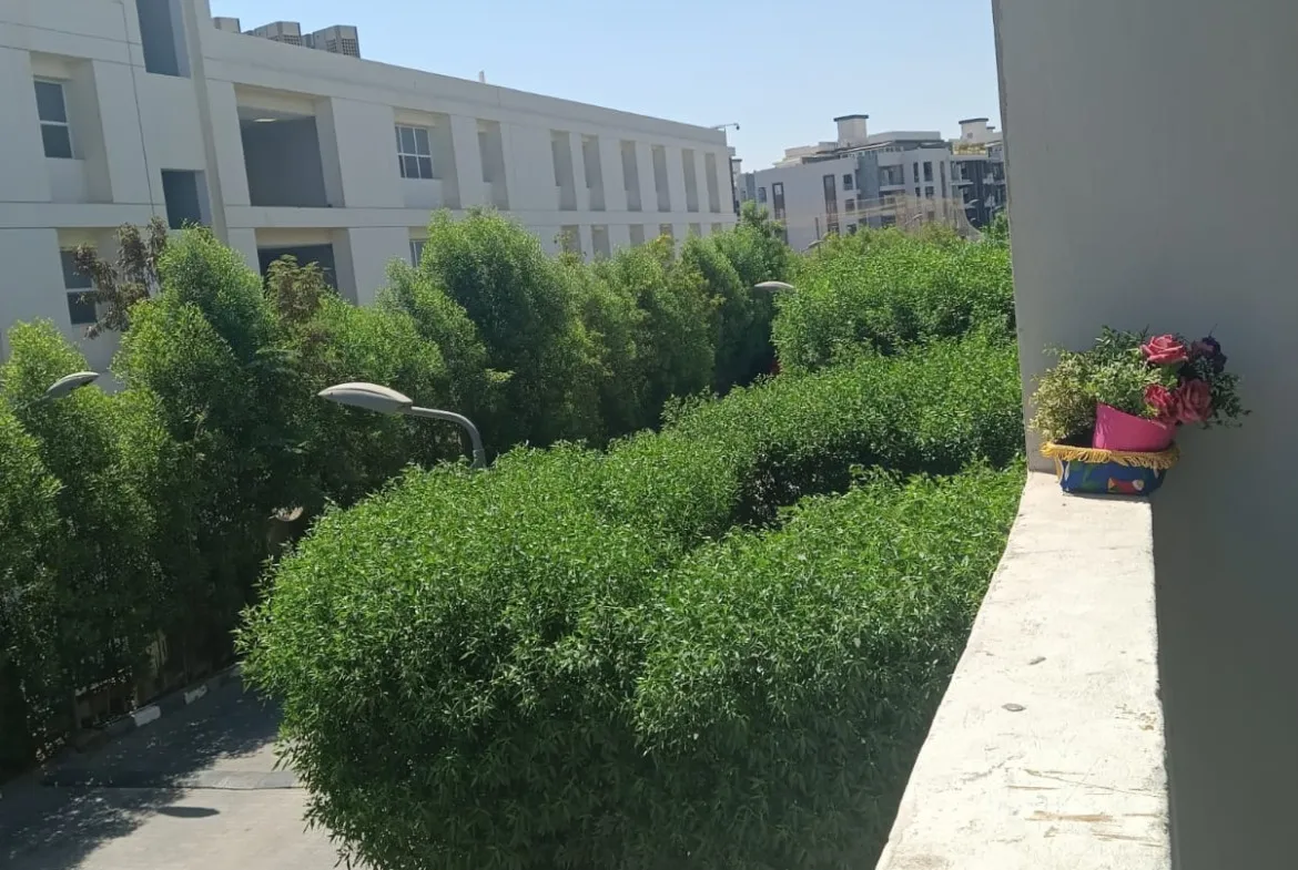 Apartment for sale in Zayed Dunes Sheikh Zayed garden view balcony - شقة للبيع في زايد ديونز الشيخ زايد بإطلالة على الجاردن