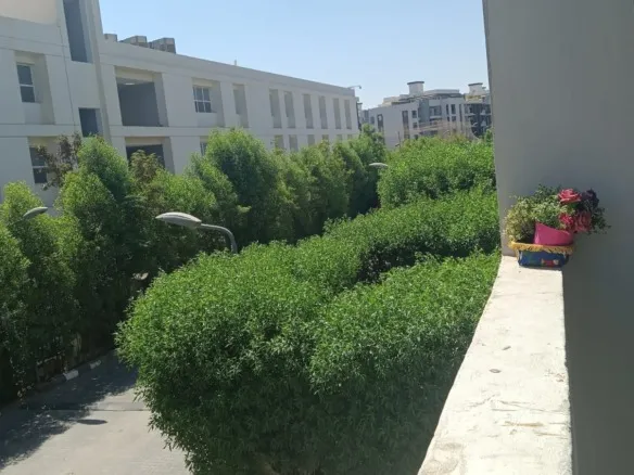 Apartment for sale in Zayed Dunes Sheikh Zayed garden view balcony - شقة للبيع في زايد ديونز الشيخ زايد بإطلالة على الجاردن