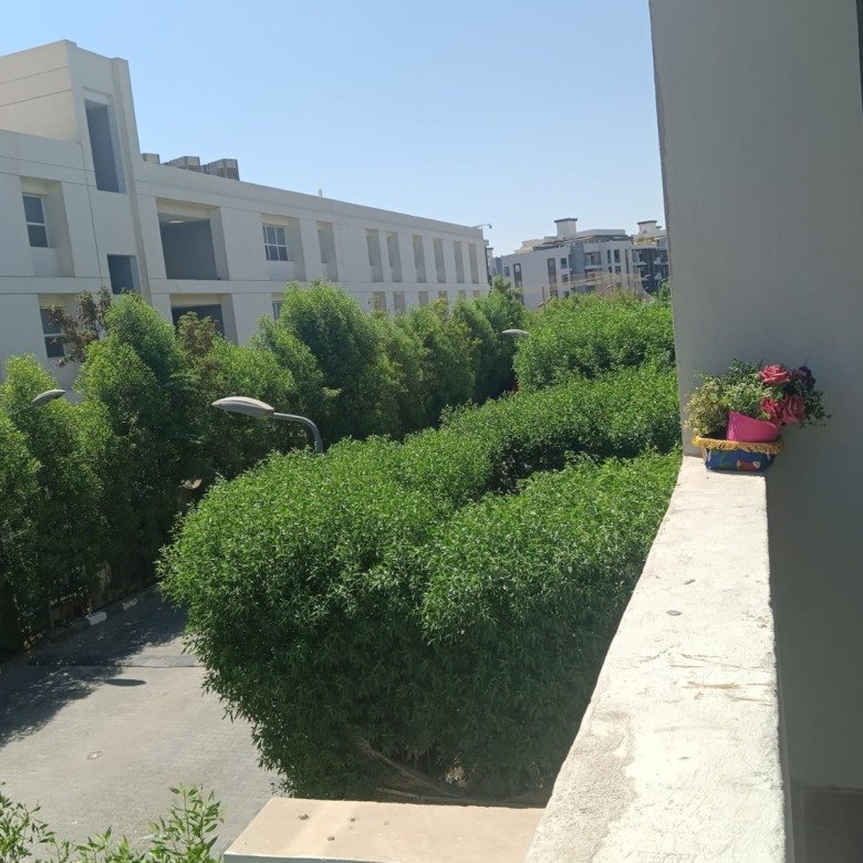 Apartment for sale in Zayed Dunes Sheikh Zayed garden view balcony - شقة للبيع في زايد ديونز الشيخ زايد بإطلالة على الجاردن