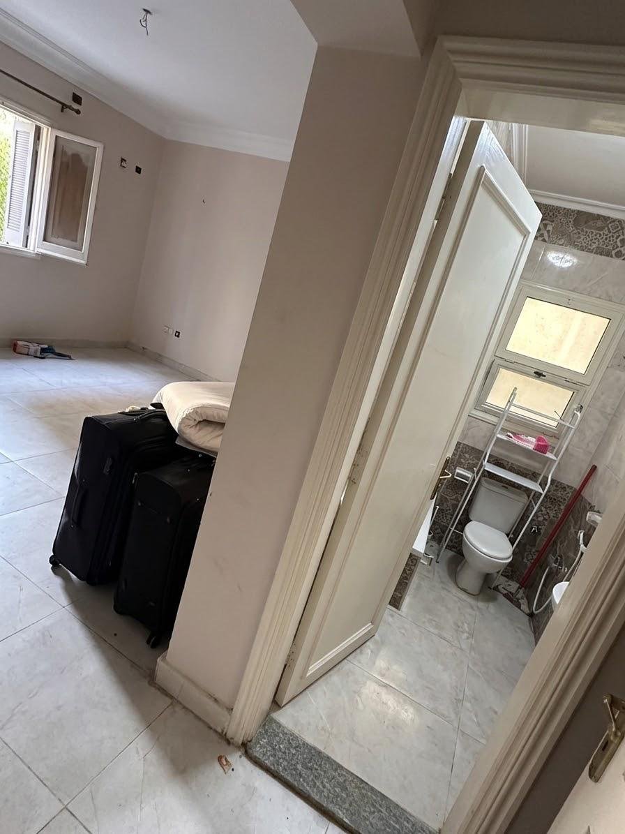 Room with a bathroom door open to the side - apartment in Sahafeen Compound, New Cairo