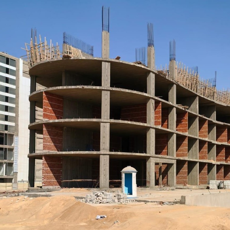 Construction exterior of Golden Tower 2 in the New Administrative Capital, illustrating the project for the 102 sqm unit for sale