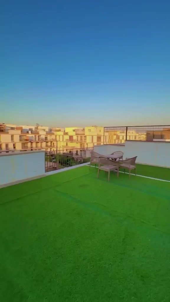 Private roof with artificial grass and outdoor table, Beverly Hills, Sheikh Zayed, studio for rent | الروف الخاص بالنجيلة الصناعية وترابيزة خارجية، بيفرلي هيلز، الشيخ زايد، استوديو للإيجار