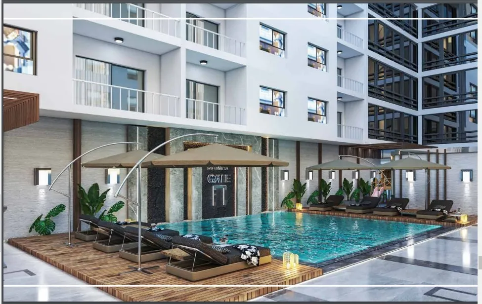 Compound pool deck - Studio for sale in Katameya Gate, New Cairo | منطقة حمام السباحة - استوديو للبيع في قطامية جيت القاهرة الجديدة