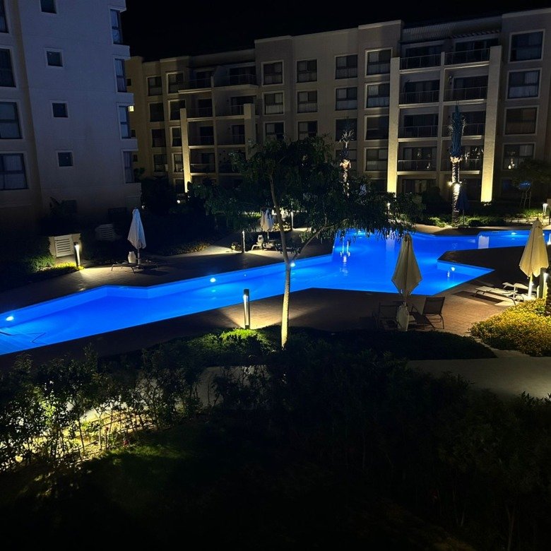 Night pool view, chalet for rent in Marassi Marina 2, North Coast - R&C Estate | فيو حمام السباحة ليلًا، شاليه للإيجار في مراسي مارينا 2، الساحل الشمالي - R&C Estate