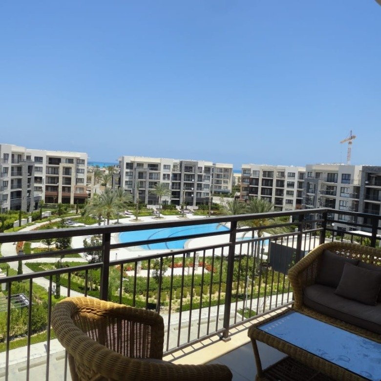 Terrace overlooking the residential pool, Marassi Marina 1 North Coast studio for rent | تراس يطل على حمام السباحة، ستوديو للإيجار في مراسي مارينا 1 الساحل الشمالي