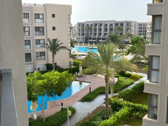 Pool view and landscaped surroundings, Marassi Marina 2 North Coast chalet for rent | فيو حمام السباحة واللاندسكيب، شاليه للإيجار في مراسي مارينا 2 الساحل الشمالي