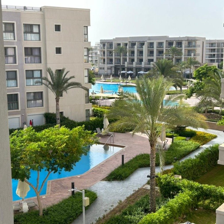 Pool view and landscaped surroundings, Marassi Marina 2 North Coast chalet for rent | فيو حمام السباحة واللاندسكيب، شاليه للإيجار في مراسي مارينا 2 الساحل الشمالي