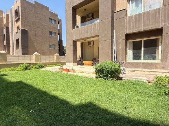 Garden and apartment exterior, The Village garden apartment for sale | الحديقة وواجهة الشقة، شقة بحديقة للبيع في ذا فيلدج