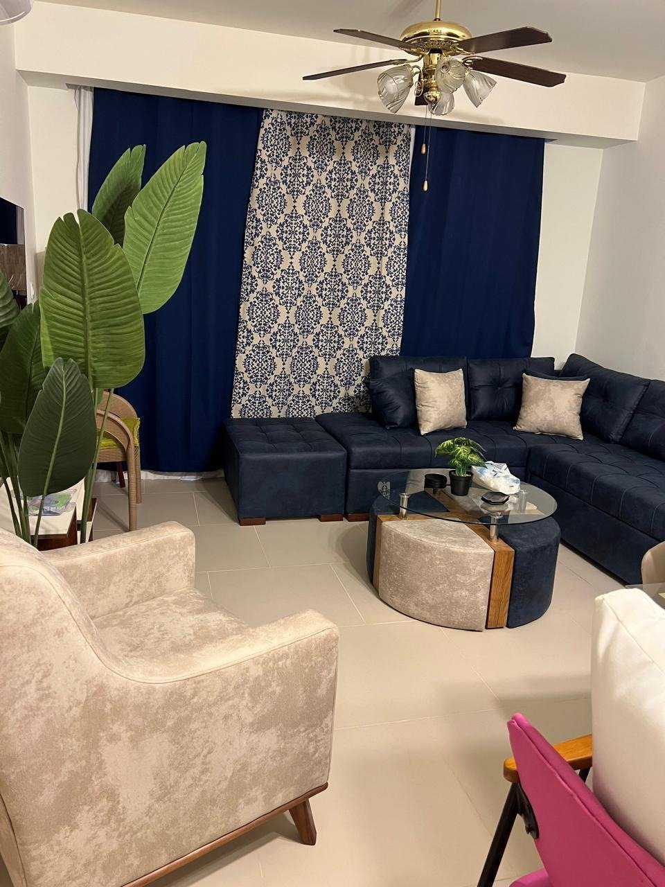 Living room with sofas, chalet for rent in Marassi Faya, North Coast | غرفة المعيشة بأرائك، شاليه للإيجار في مراسي فايا، الساحل الشمالي