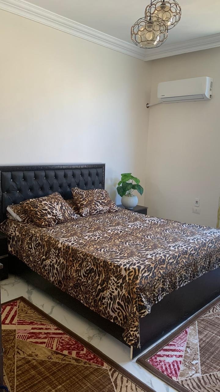 11-andalos-furnished-rent-256-03 Bedroom with air conditioning, furnished apartment for rent in El-Andalos, Fifth Settlement | غرفة نوم مكيفة، شقة مفروشة للإيجار في الأندلس بالتجمع الخامس