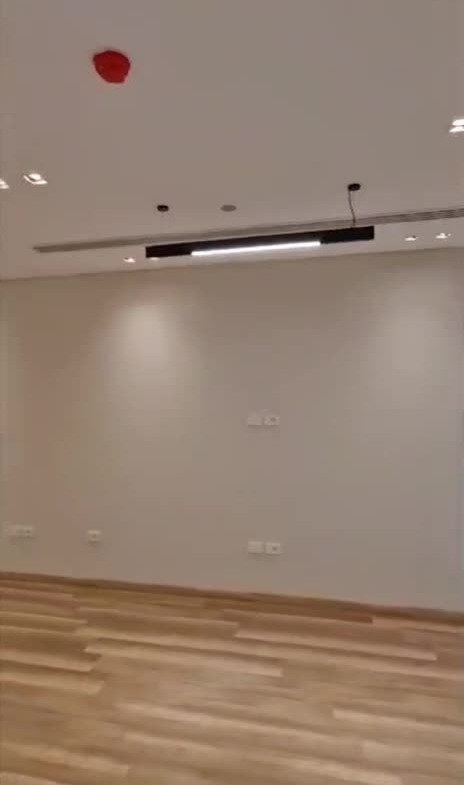 Empty room with recessed ceiling lights - office in Hyde Park, New Cairo