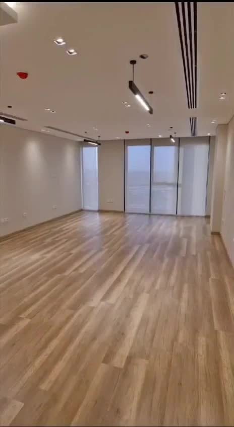 Empty reception with wooden flooring - office in Hyde Park, New Cairo