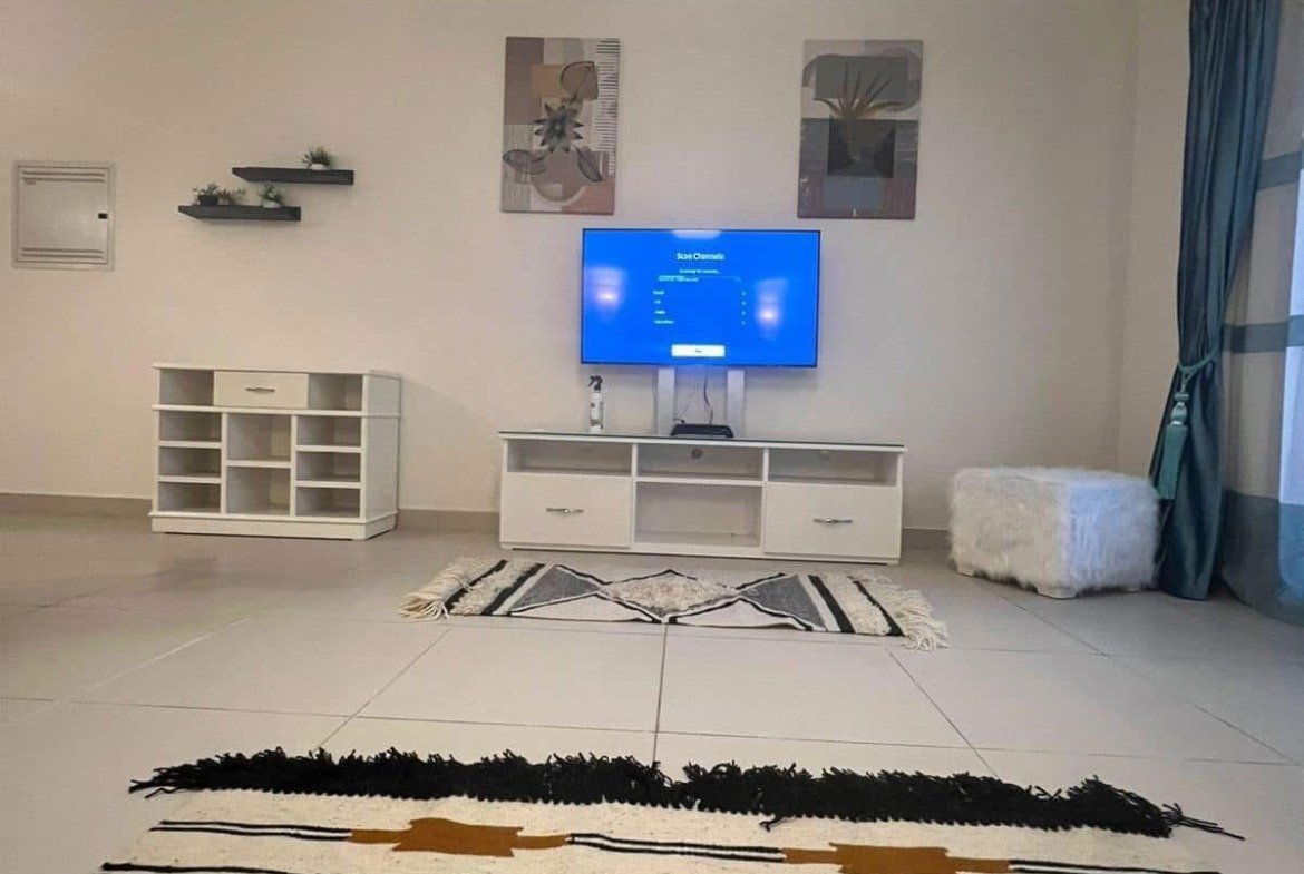 Living room furniture and television, Marassi Marina 2 North Coast chalet for rent | أثاث المعيشة والتلفزيون، شاليه للإيجار في مراسي مارينا 2 الساحل الشمالي