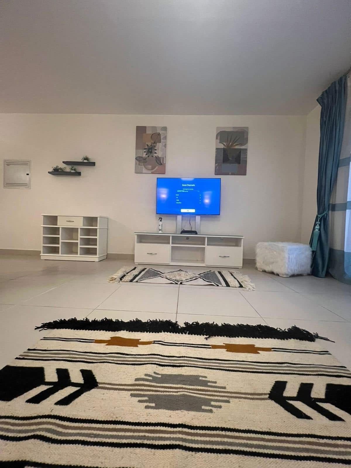 Living room furniture and television, Marassi Marina 2 North Coast chalet for rent | أثاث المعيشة والتلفزيون، شاليه للإيجار في مراسي مارينا 2 الساحل الشمالي