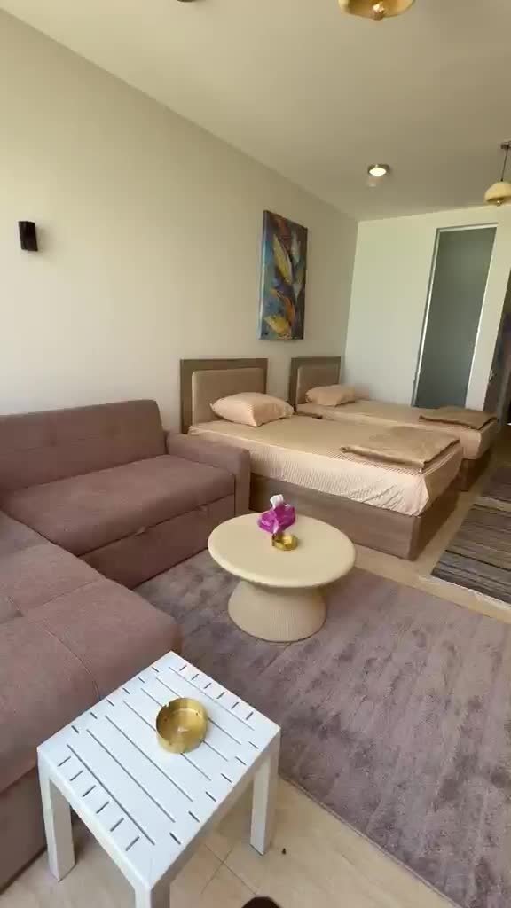 Furnished sleeping and seating area of the cabana | منطقة النوم والجلوس المفروشة بالكابانا