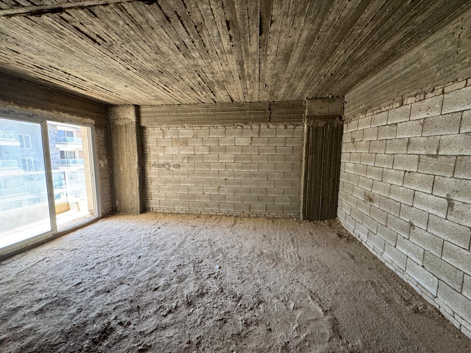 15-icity-clubpark-apartment-sale-349-05 Unfinished room with terrace doors, apartment for sale in Mountain View iCity Club Park, New Cairo | غرفة بدون تشطيب بأبواب التراس، شقة للبيع في ماونتن فيو إي سيتي كلوب بارك، القاهرة الجديدة