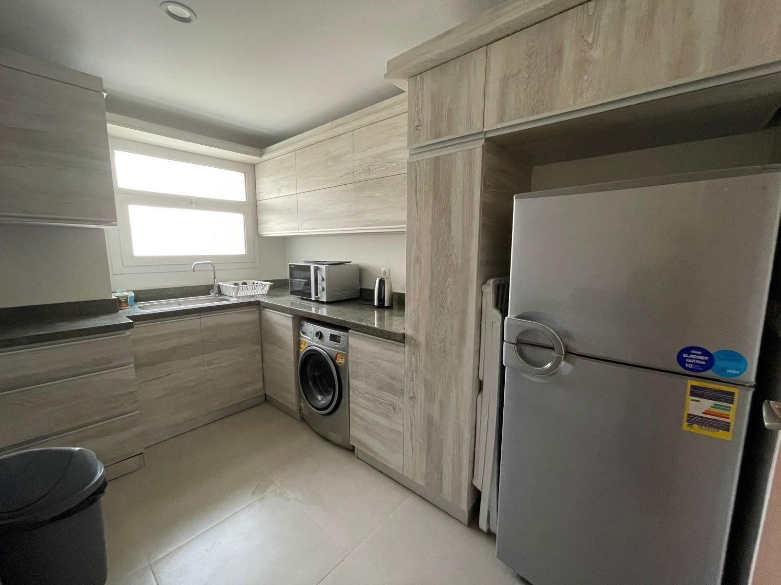 15-mivida-boulevard-apartment-rent-328-05 Equipped kitchen, apartment for rent in Mivida Boulevard, New Cairo | مطبخ مجهز، شقة للإيجار في ميفيدا البوليفارد، القاهرة الجديدة
