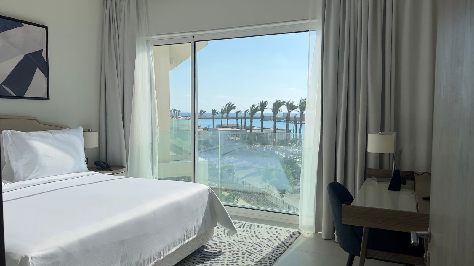 Bedroom opening onto the balcony in Marassi, North Coast