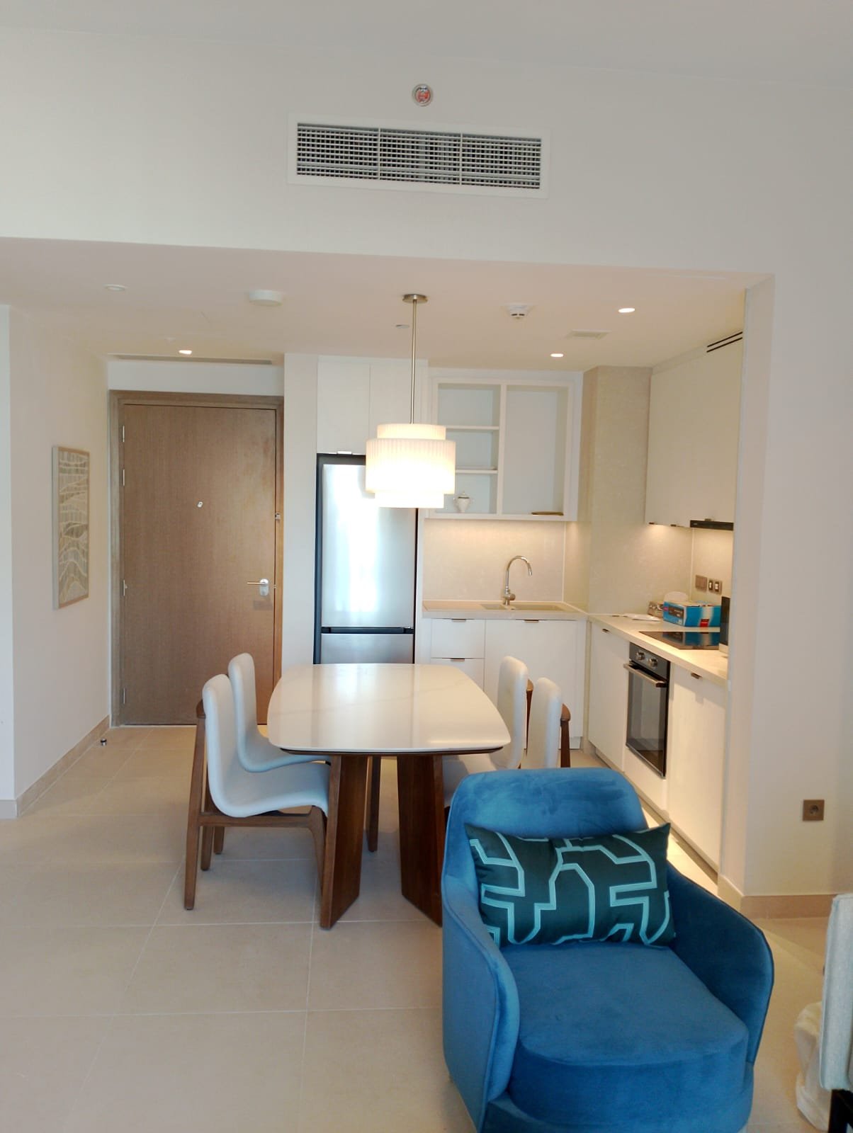 Dining table and open kitchen in Marassi, North Coast