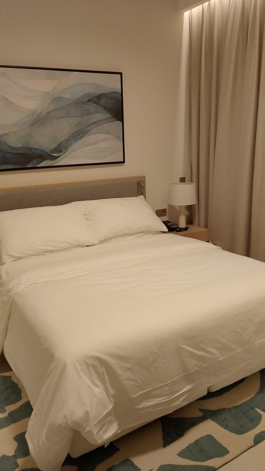 Bed with white linen in Marassi, North Coast