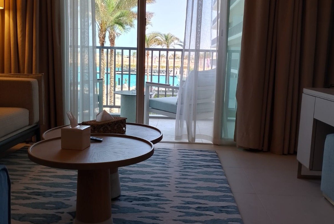 Living room opening onto the balcony in Marassi, North Coast