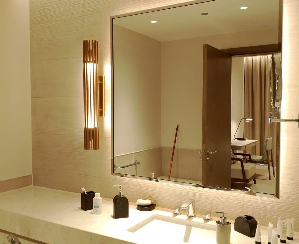 Bathroom washbasin and illuminated mirror in Marassi, North Coast