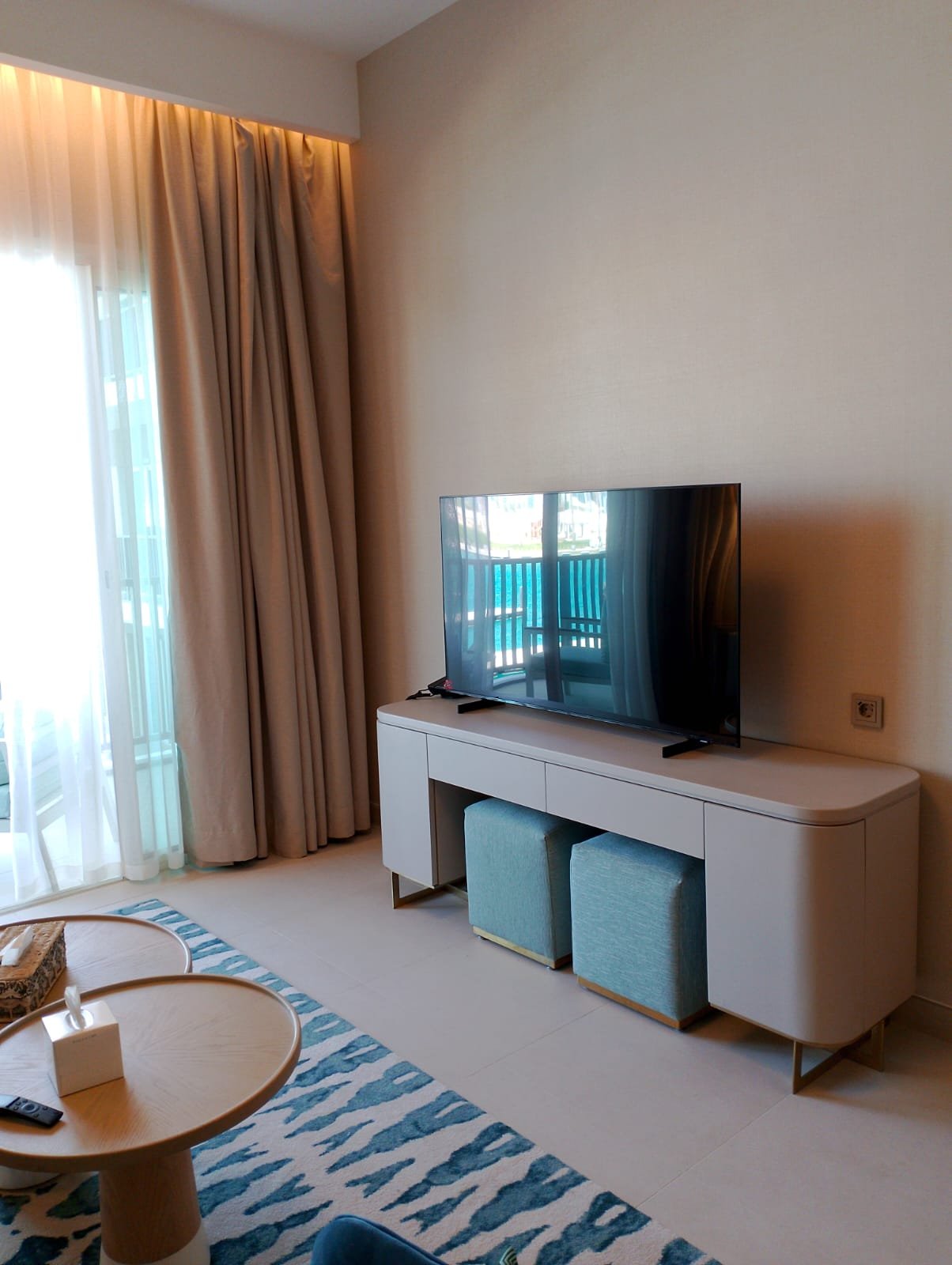 Television cabinet beside the balcony doors in Marassi, North Coast