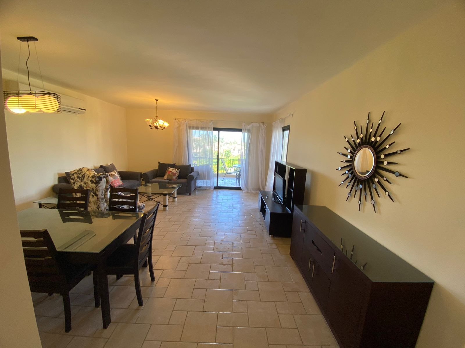 Living and dining space, chalet for rent in Marassi Catania, North Coast | مساحة المعيشة والطعام، شاليه للإيجار في مراسي كاتانيا، الساحل الشمالي