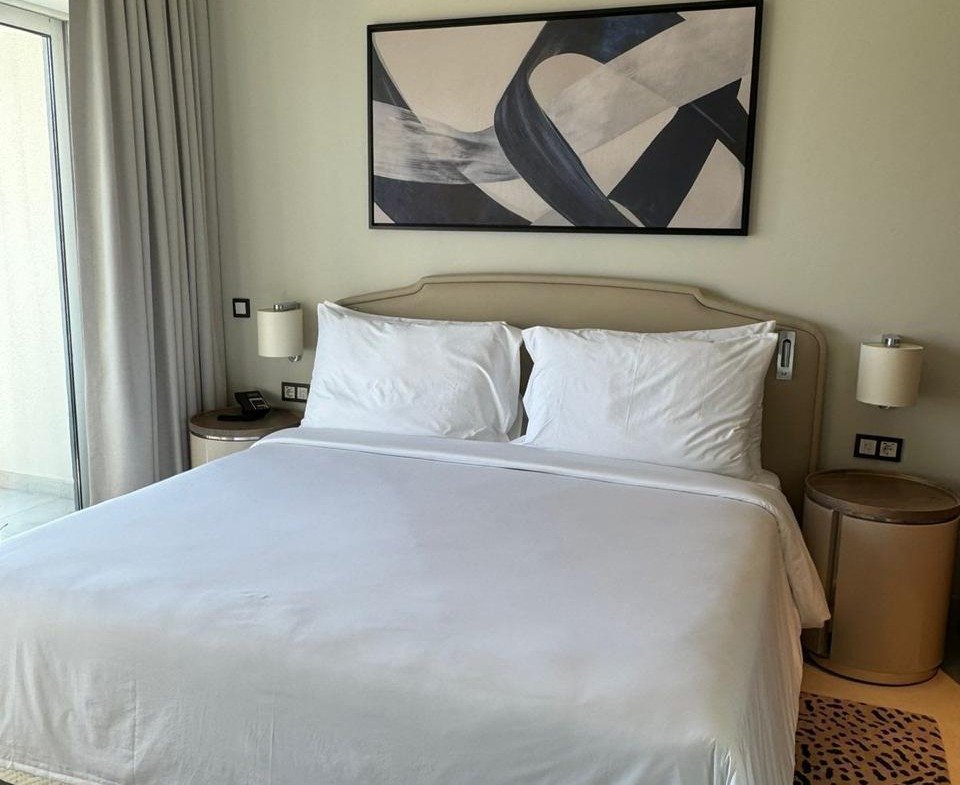 Bedroom with bedside lamps in Marassi, North Coast