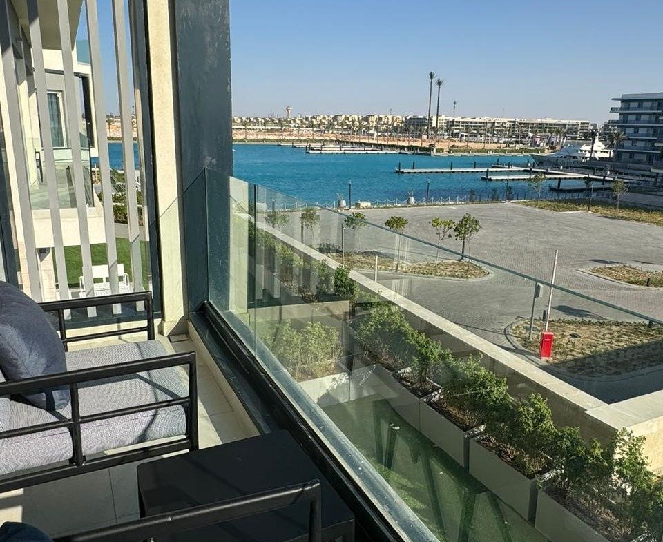 Balcony seating overlooking the marina in Marassi, North Coast