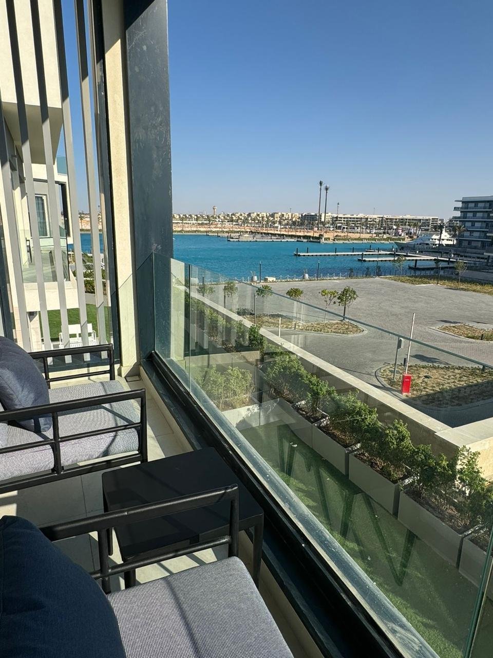Balcony seating overlooking the marina in Marassi, North Coast