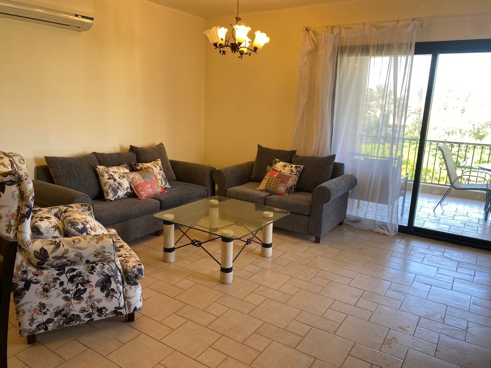 Living room with terrace access, chalet for rent in Marassi Catania, North Coast | غرفة المعيشة ومدخل التراس، شاليه للإيجار في مراسي كاتانيا، الساحل الشمالي