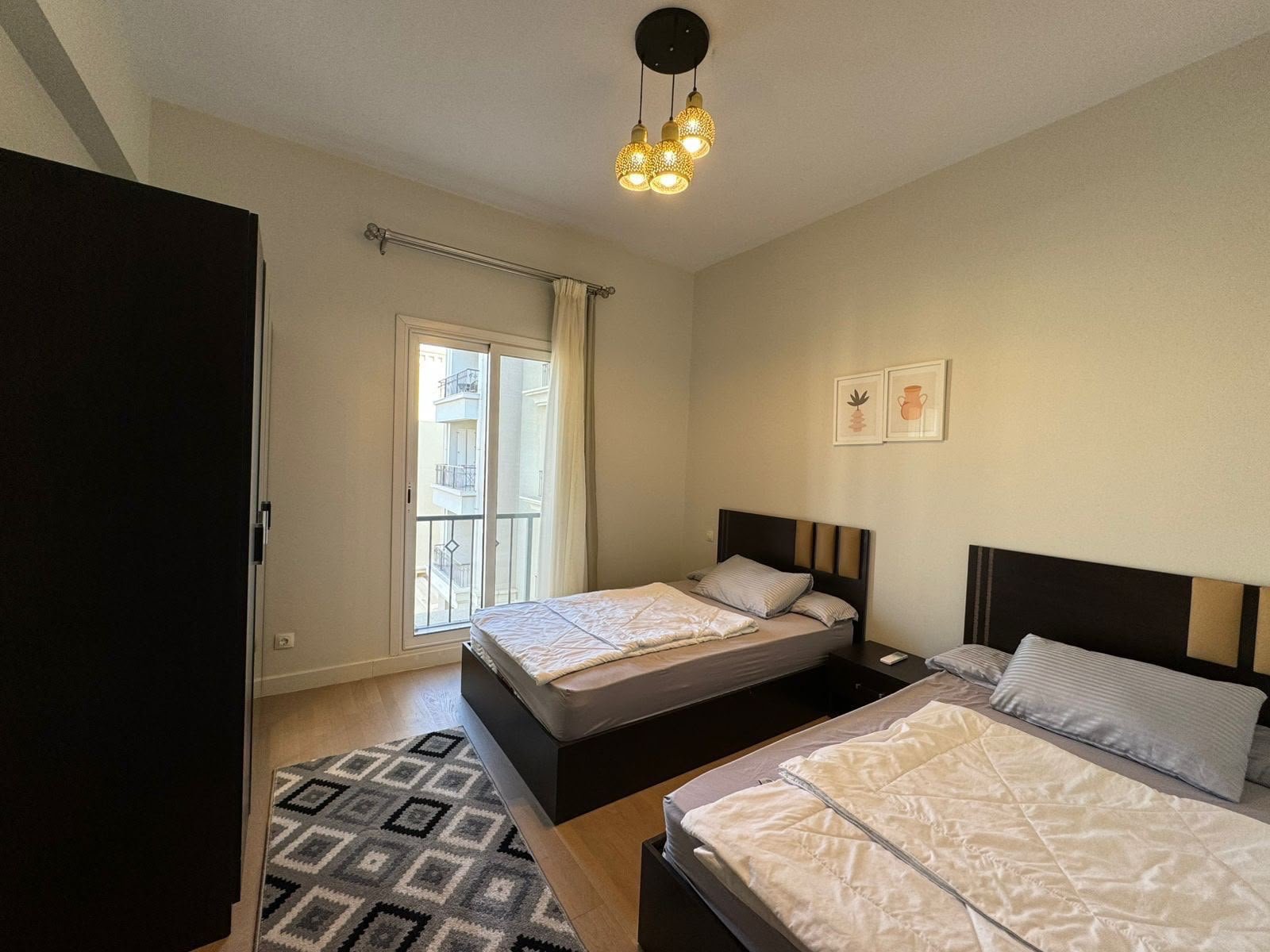 18-mivida-boulevard-apartment-rent-328-08 Twin bedroom, apartment for rent in Mivida Boulevard, New Cairo | غرفة نوم بسريرين، شقة للإيجار في ميفيدا البوليفارد، القاهرة الجديدة