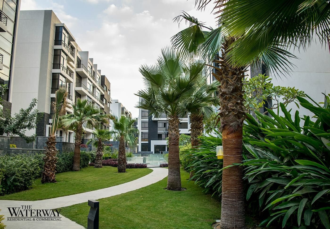 188-waterway1-duplex-sale-326-01 Landscaped compound view, duplex for sale in Waterway 1, New Cairo | إطلالة مساحات الكمبوند الخضراء، دوبلكس للبيع في واتر واي 1، القاهرة الجديدة