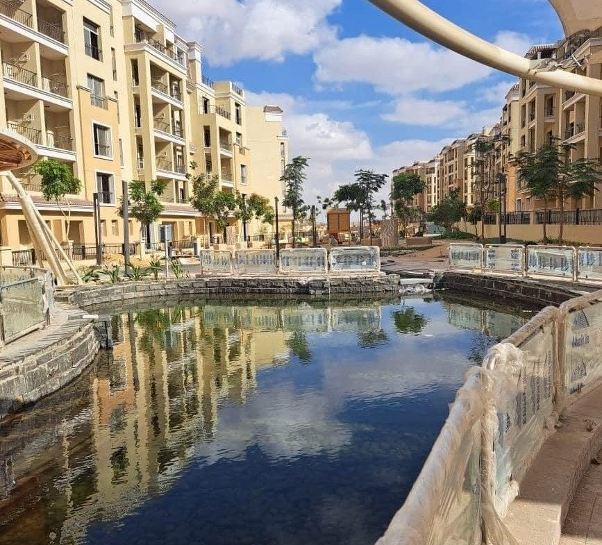 Sarai landscaped water feature and apartment buildings | مسطح مائي ولاندسكيب وعمارات سراي