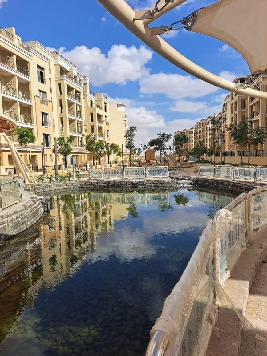 Sarai landscaped water feature and apartment buildings | مسطح مائي ولاندسكيب وعمارات سراي