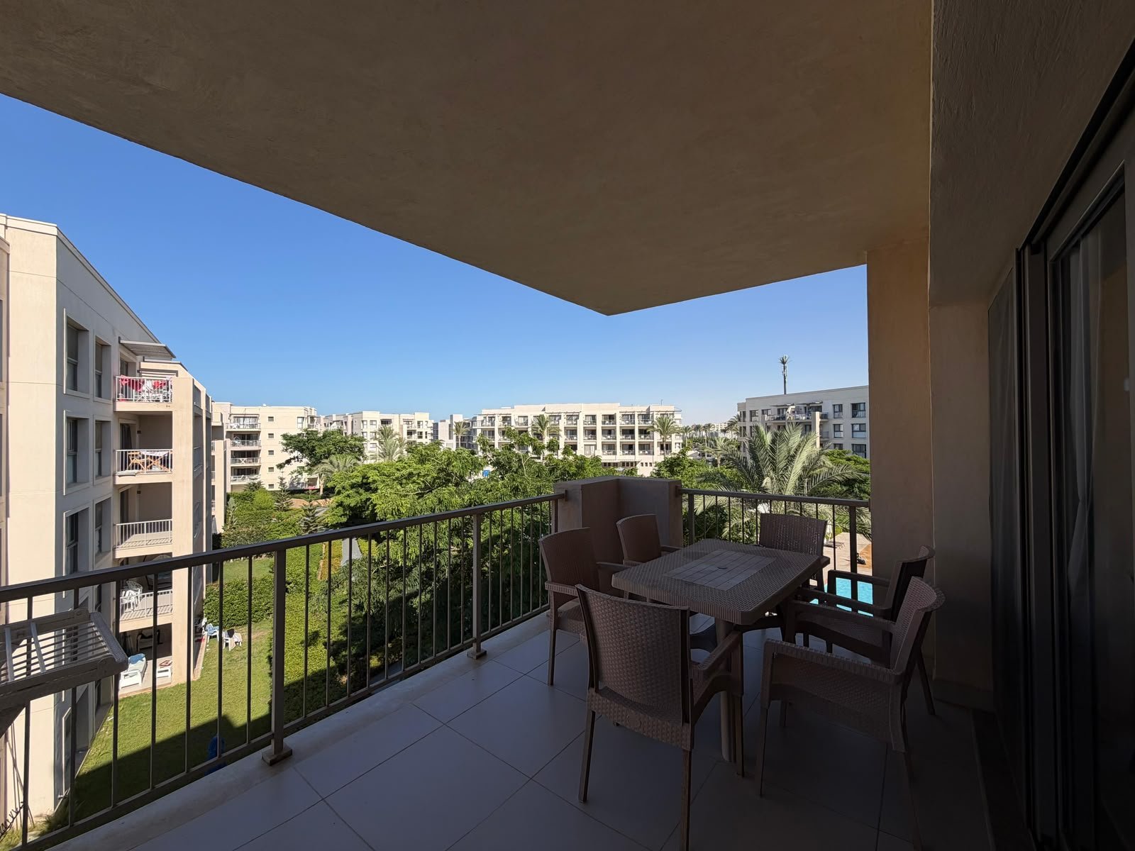 22-marassi-marina-2-300-01 Terrace and landscaped pool surroundings, chalet for rent in Marassi Marina 2, North Coast | تراس والمساحات المزروعة حول حمام السباحة، شاليه للإيجار في مراسي مارينا 2، الساحل الشمالي
