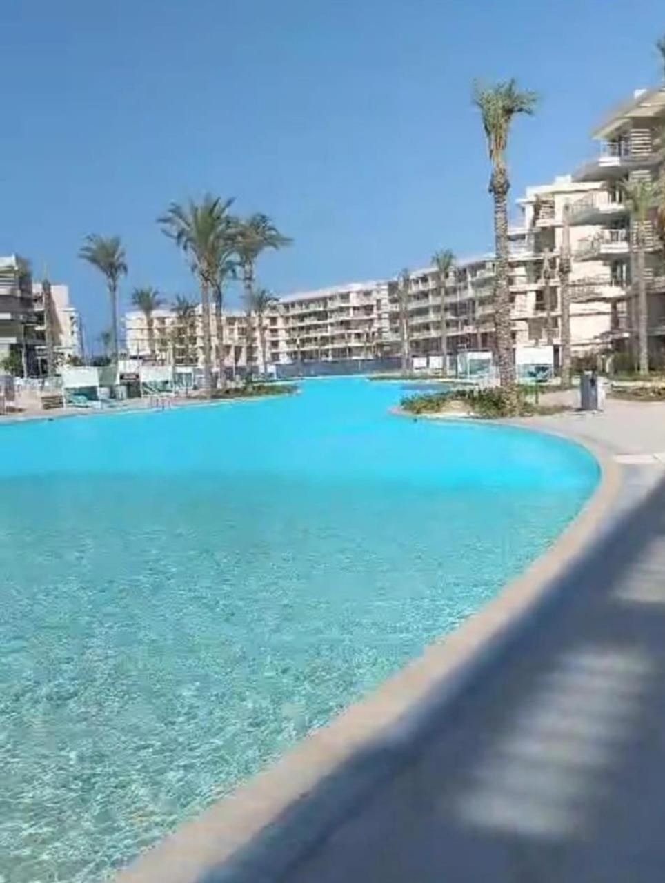 22-marassi-marina-views-293-01 Lagoon view beside the buildings, chalet for rent in Marassi Marina Views, North Coast | إطلالة اللاجون بجوار المباني، شاليه للإيجار في مراسي مارينا فيوز، الساحل الشمالي