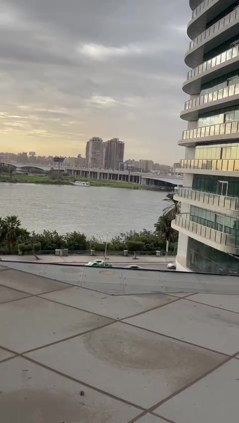 231-f05 Balcony with a river view between buildings - hotel apartment in Marassi