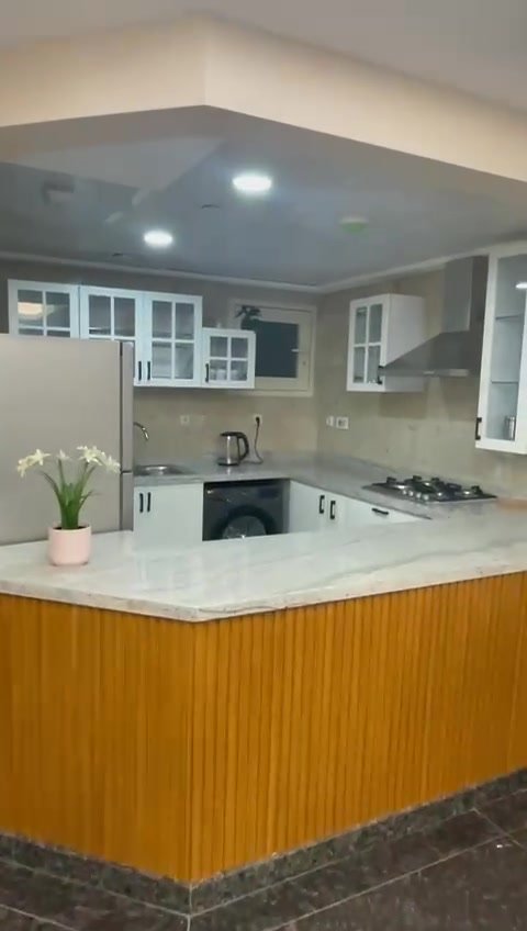 231-f06 Kitchen island with a wooden front and white cabinets - hotel apartment in Marassi