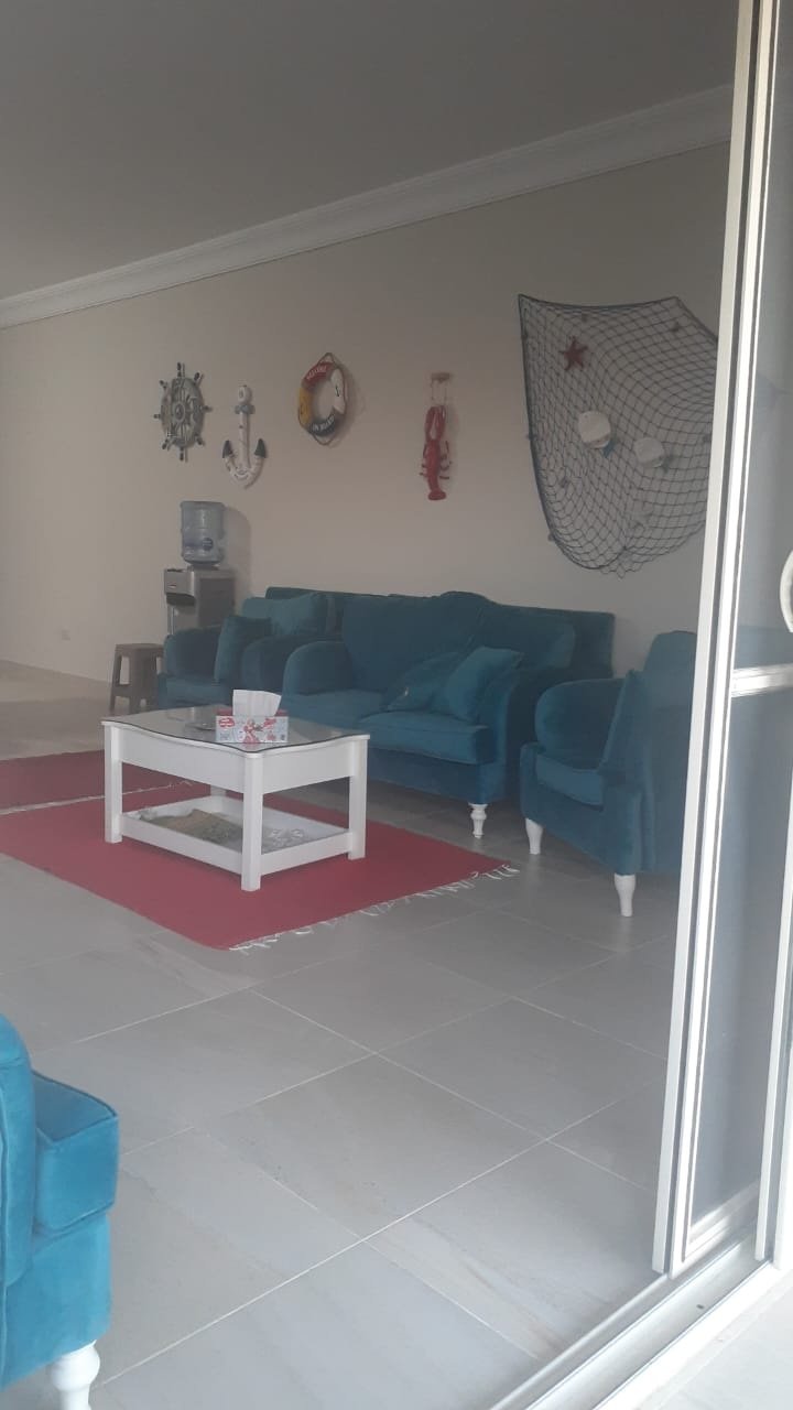 Furnished living room, La Vista Bay East North Coast twin house for sale | غرفة معيشة مفروشة، توين هاوس للبيع في لافيستا باي إيست الساحل الشمالي