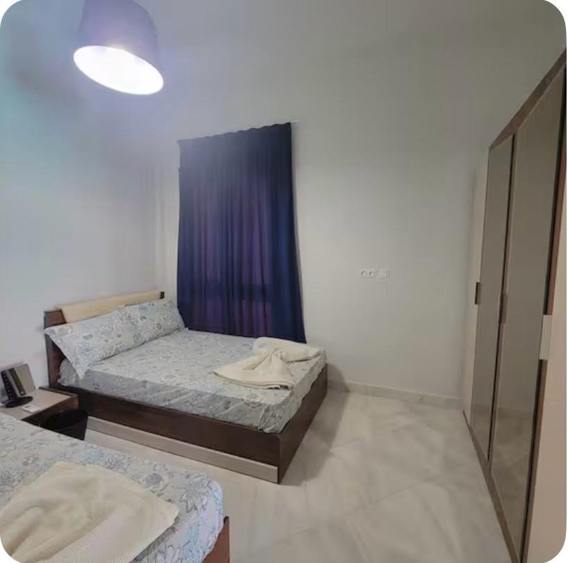 Bedroom with two beds, chalet for rent in Marassi Blanca, North Coast | غرفة نوم بسريرين، شاليه للإيجار في مراسي بلانكا، الساحل الشمالي