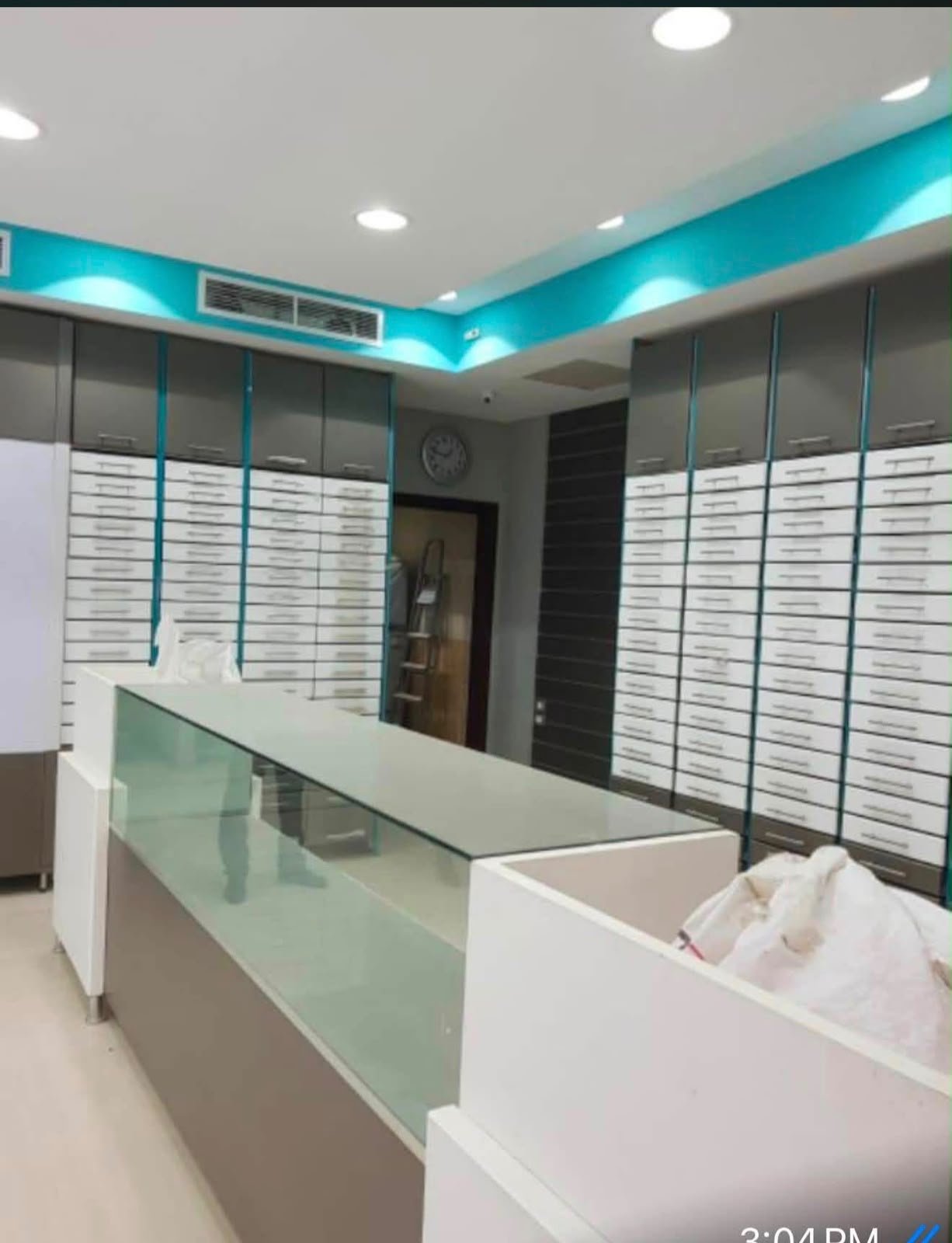 3-nasr-city-pharmacy-sale-353-02 Pharmacy interior with fitted counter | تجهيزات الصيدلية والكونتر