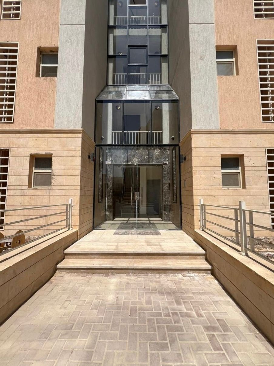 Residential building entrance and lift in Promenade, Fifth Settlement, New Cairo, apartment for sale | مدخل المبنى السكني والأسانسير في برومناد التجمع الخامس، شقة للبيع