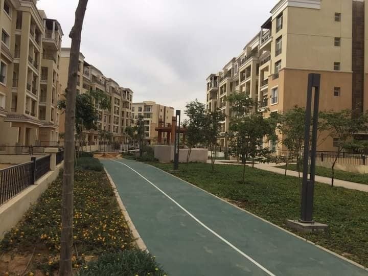 Sarai landscaped walkway between apartment buildings | ممشى وحدائق بين عمارات سراي