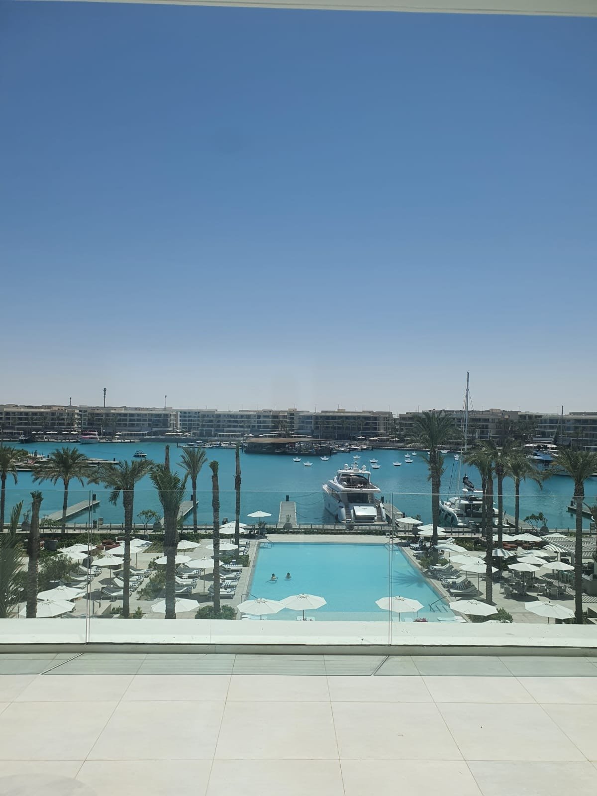 Marina view from the apartment, apartment for rent in Vida Marassi, North Coast | إطلالة على المارينا من الشقة، شقة للإيجار في فيدا مراسي، الساحل الشمالي