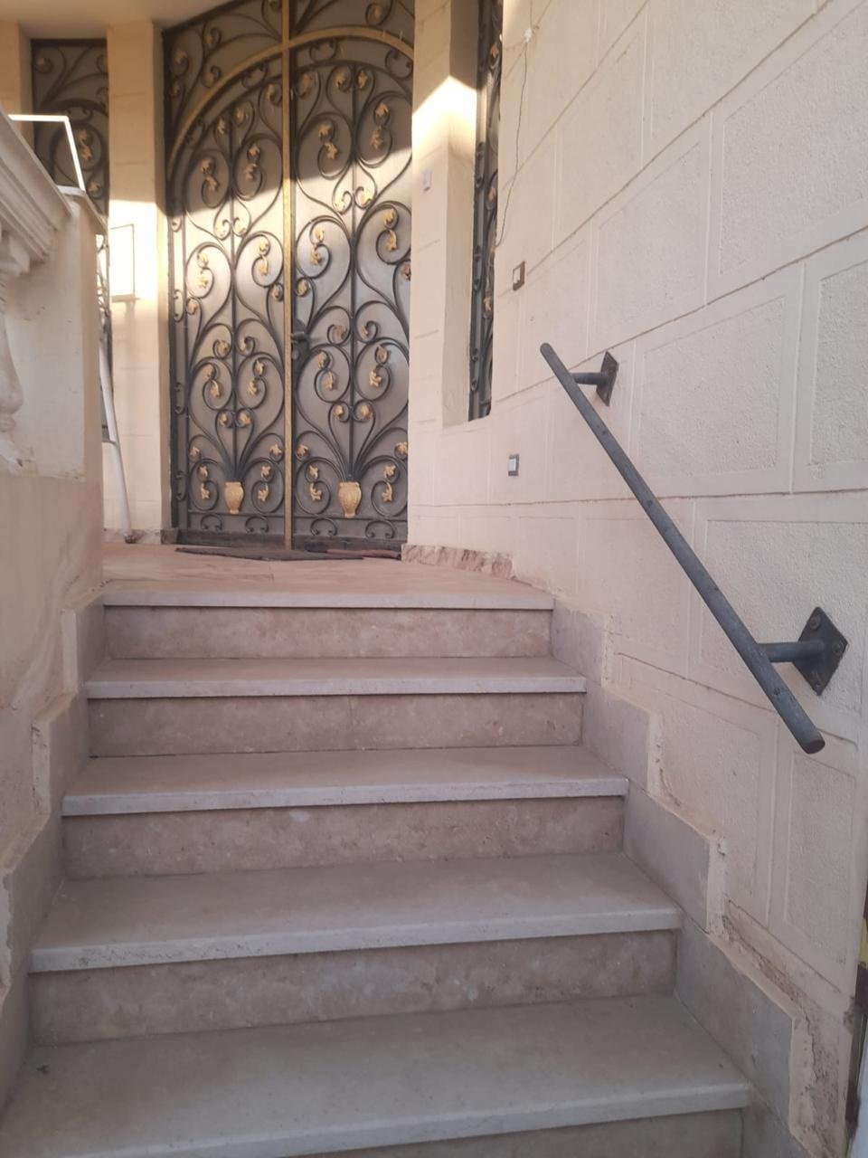 30-district2-villa-building-sale-435-08 Internal stairs and security door, District 2 villa building for sale | سلم داخلي وباب أمان، مبنى فيلا للبيع في الحي الثاني