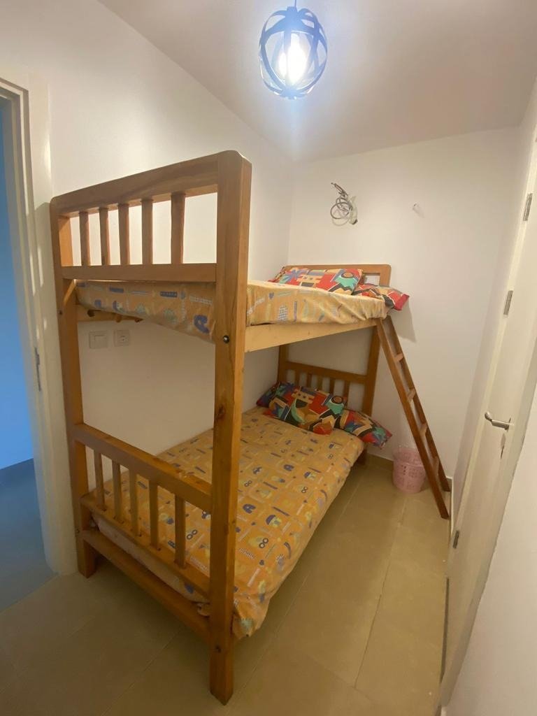Room with bunk beds, chalet for rent in Marassi Marina Residences, North Coast | غرفة بسرير بطابقين، شاليه للإيجار في مراسي مارينا ريزيدنس، الساحل الشمالي